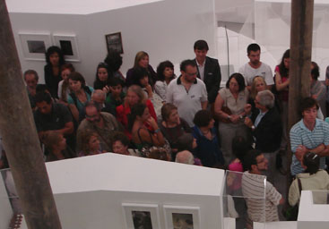 confe2 The view of exhibition room 1, with Petruschansky guiding the visit.